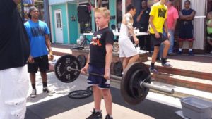 teenager deadlifting at a charity unsanctioned powerlifting event