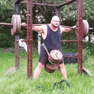 Bud Jeffries doing a combination belt squat and back squat