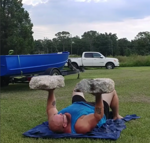 Bud Jeffries floor pressing two large stones