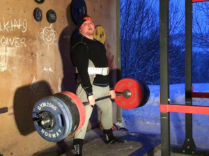 IPF Nordic Champion Erik Røen deadlifting in his Viking cave