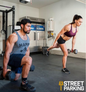 Miranda Oldroyd and Julian Alcaraz perform a Street Parking workout in their garage gym