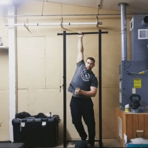 Wim Hoff Method student Rob Brinkley stretching in his garage gym