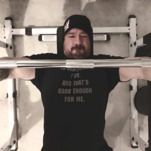 GDiesel benching in a Garage Gym Life t shirt