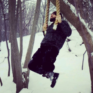 Ross Enamait doing pullups in the snow