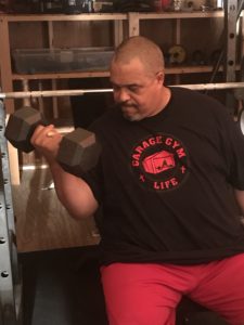 Iron Mike Reid training in his shed gym