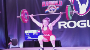 Kristin Pope hitting a PR snatch at the 2018 Arnold Fitness Expo