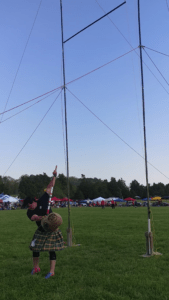 Timothy Louisignau setting up for a sheaf toss