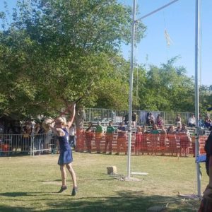 Heidi King follows through on a sheaf toss