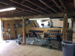 Dumbell rack and utility benches at BarnFit Gym