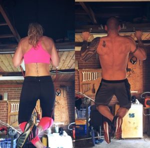 Tim Geurts and Chantal Lekkerkerker doing pull ups in their garage gym