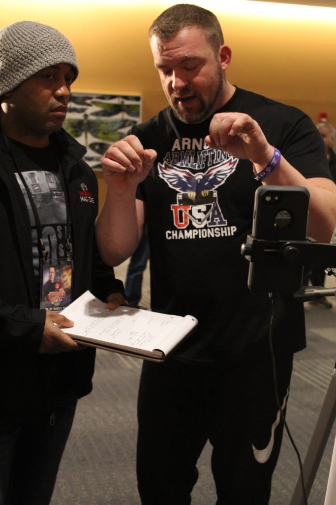 Jedd Johnson explaining the rules during the livestream of the 2019 Arnold Armlifting Championships